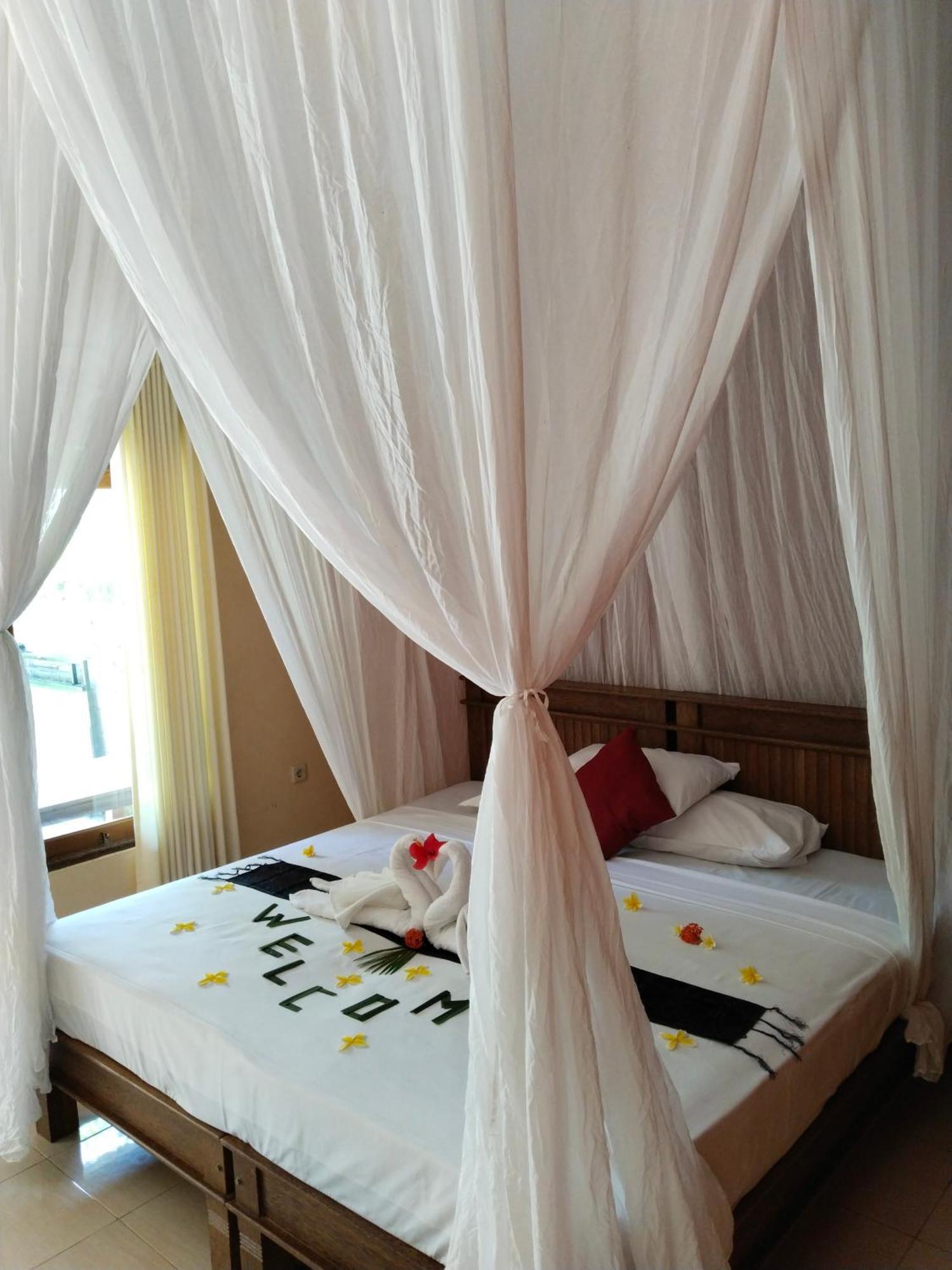 Asih Homestay 페무테란 객실 사진